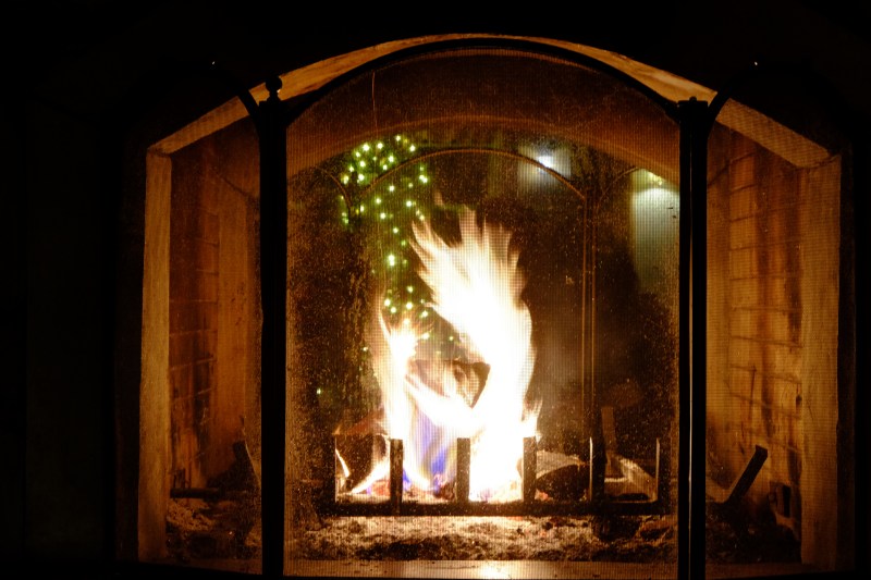 Flames dancing in large fireplace