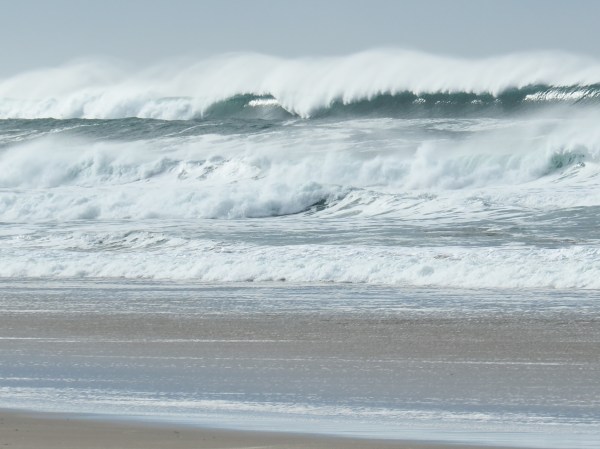 White-capped surf and beach