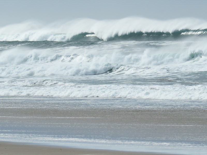 White-capped surf and beach
