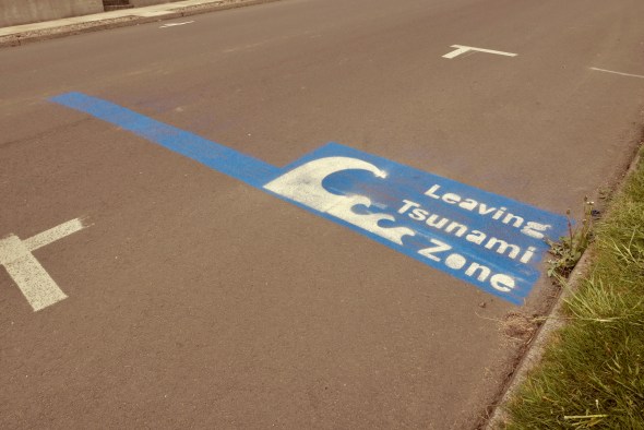 Parking space marked "Leaving Tsunami Zone"
