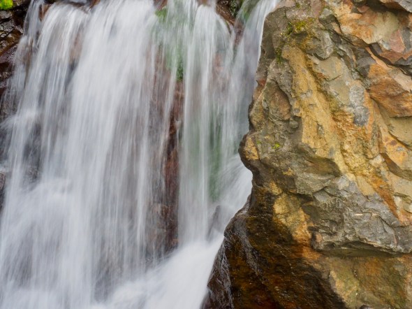 Little waterfall and boulder