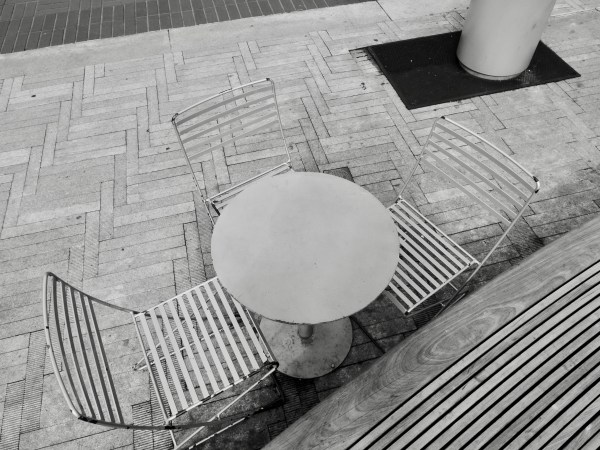 Circular table, chairs, bench and pavers