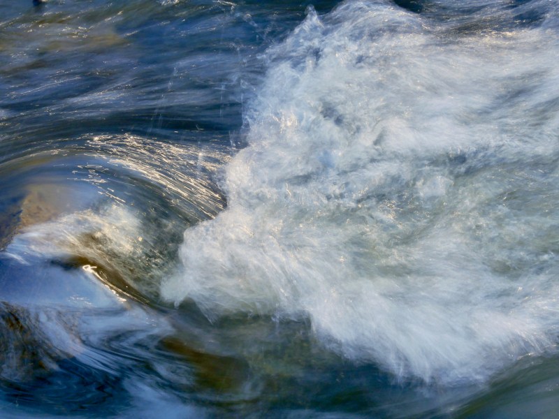 Whitewater riffle in river