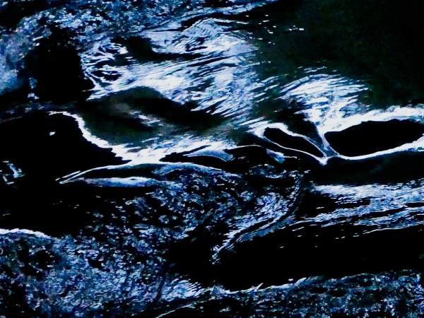 Dark water with light ripples