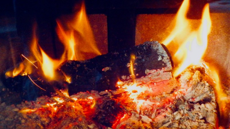 Logs burning in woodstove