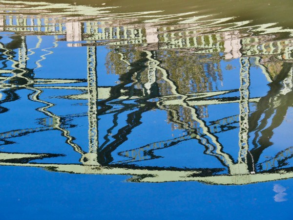 bridge reflected in river
