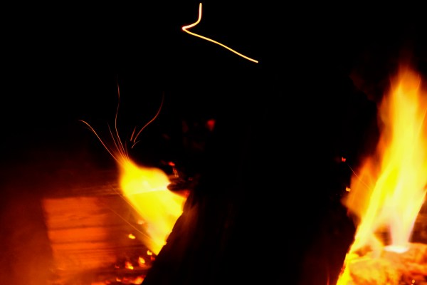 campfire burning at night