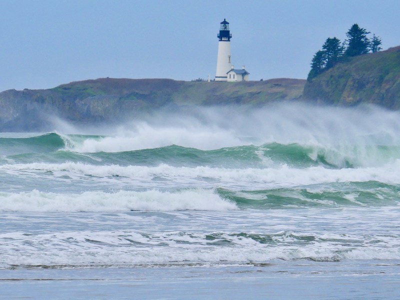 Yaquina Head Lighthouse and surf, Oregon