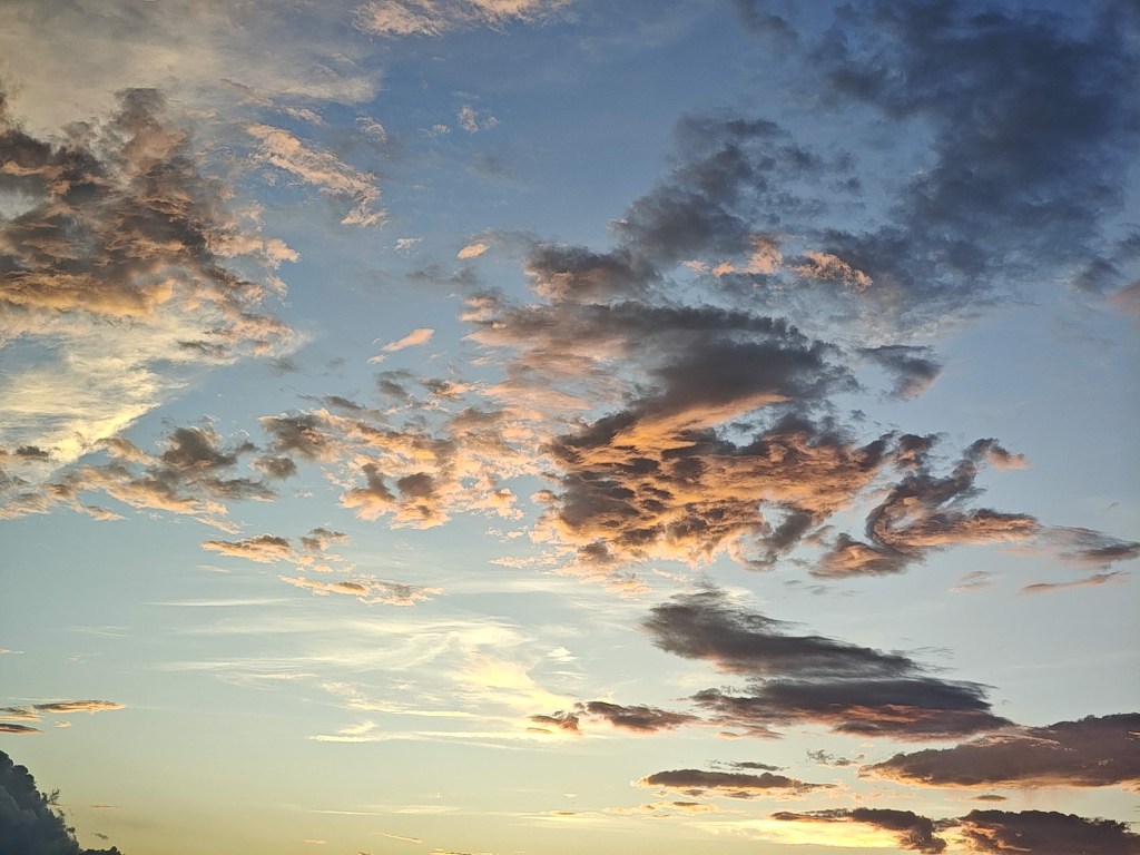 colorful orange clouds in western sky